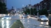 KOSOVO/HEAY RAIN/PRISHTINA STREETS