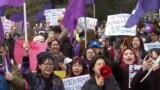 Kyrgyzstan - protesters demonstrate against domestic violence and for women's rights in Bishkek on International Women's Day - screen grab 