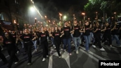 Armenia - Opposition supporters march to the Armenian Genocide Memorial in Yerevan, April 23, 2024.