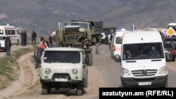 Armenia - A convoy of vehicles carrying refugees from Nagorno-Karabakh arrives in the border village of Kornidzor, September 24, 2023.