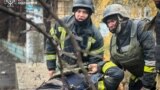 A State Emergency Service photographer captured these images of first responders who had arrived at the site of a Russian missile strike in the southern Ukrainian city of Odesa who were themselves struck by a second missile. A paramedic and an emergency service worker were among the at least 19 people killed during the March 15 attack, officials said.