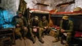 Soldiers of the 21st Separate Mechanized Brigade rest inside their quarters in the Donetsk region, Ukraine, on April 26.