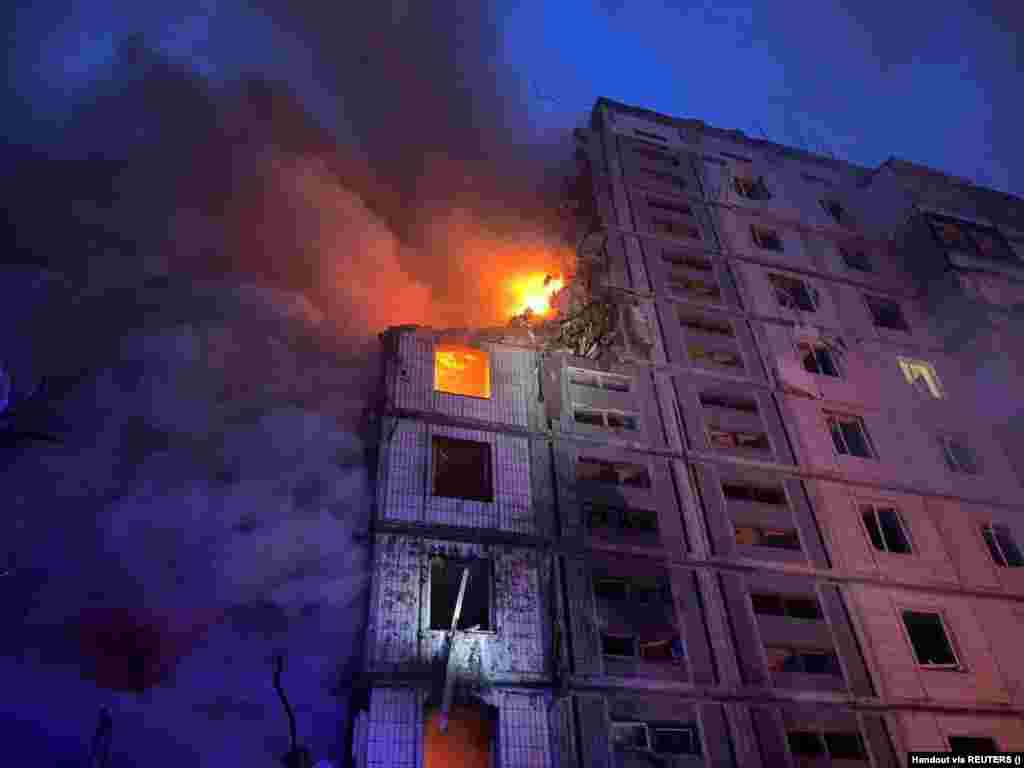 A residential building in Uman burns following a Russian missile strike in the early morning of April 28.&nbsp; According to regional governor Igor Taburets, two cruise missiles struck the nine-story building, killing at least 10 people, including two children. &nbsp; 