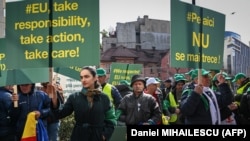 Romanian farmers protest in the front of the European Commision headquarters in Bucharest on April 7.