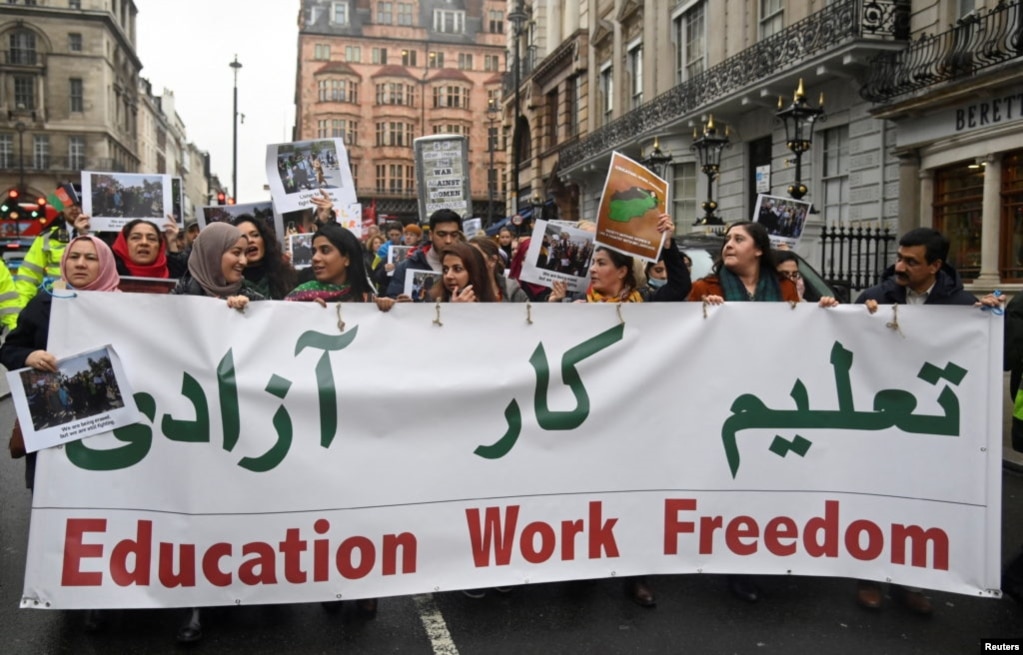 Protesters participate in a rally in support of Afghan women's rights in London. (file photo)