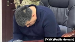 Урмат Самаев во время задержания. 