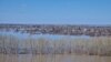 A view of Zarechnyi village near the city of Kostan in southern Kazakhstan on April 14, where its railway tracks and bridges have been submerged by floodwaters. Spring flooding has forced more than 110,000 Kazakhs to evacuate, government officials said on April 15.<br />
&nbsp;