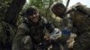 A Ukrainian soldier administers first aid to a wounded 19-year-old comrade on September 4. The unit was battling Russian forces near the eastern city of Bakhmut.<br />
<br />
The situation along the eastern front line remains difficult for Ukraine&#39;s troops as they defend and prevent the loss of strongholds, General Oleksandr Syrskiy, commander of Ukraine&#39;s ground forces, said on September 6.