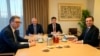 Serbian President Aleksandar Vucic (left) and Kosovo Prime Minister Albin Kurti (right) meet with European Union foreign policy chief Josep Borrell (second left) in Brussels on February 27.