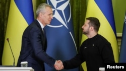 NATO Secretary-General Jens Stoltenberg and Ukrainian President Volodymyr Zelenskiy attend a joint news briefing in Kyiv on April 20.