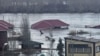 A house is washed away in the flooding in Kostanay City, Kazakhstan, on April 9.