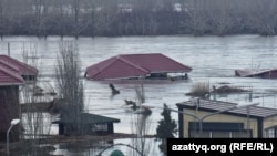 A house is washed away in the flooding in Kostanay City, Kazakhstan, on April 9.