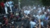 Armenia - Protesters and riot police clash outside the Armenian parliament, Yerevan, June 12, 2024