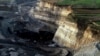 Prijedor, Bosnia and Herzegovina -- A drone shot of excavation at a recently opened coal mine