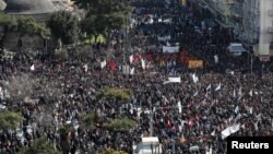 Афины шаарындагы демонстрациялардан тартылган сүрөт.
