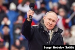 Президент РФ Владимир Путин во время выступления на митинге-концерте «Слава защитникам Отечества», посвященного войне России против Украины. Москва, 22 февраля 2022 года