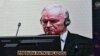 Ratko Mladić na tv ekranu tokom prenosa uživo izricanja presude sudija UN-a, 8. juna 2021. godine u Hagu