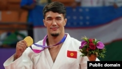 Эрлан Шеров