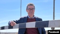 Armenia - Former NATO Secretary General Anders Fogh Rasmussen stands at an Armenian border checkpoint leading to the Lachin corridor, March 14, 2023.