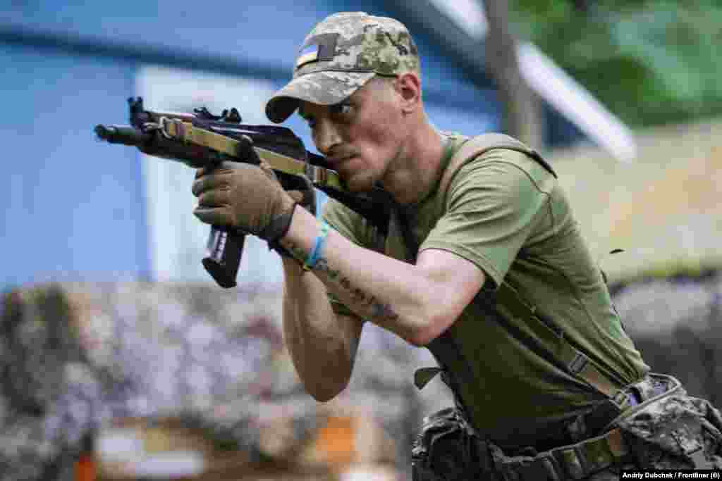 A paroled Ukrainian convict is seen in training at an undisclosed location in central Ukraine in July. As Europe&#39;s biggest land war since World War II rages on, members of Ukraine&#39;s 1st &quot;Da Vinci&quot; Assault Battalion are preparing ex-prisoners for battle against Russian forces. &nbsp;