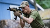 A paroled Ukrainian convict is seen in training at an undisclosed location in central Ukraine in July.<br />
<br />
As Europe&#39;s biggest land war since World War II rages on, members of Ukraine&#39;s 1st &quot;Da Vinci&quot; Assault Battalion are preparing ex-prisoners for battle against Russian forces.<br />
<br />
&nbsp;