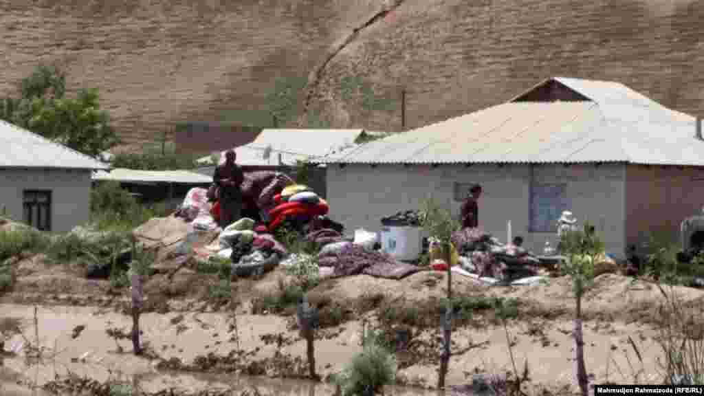 Villagers salvage belongings from their homes after the worst flooding since&nbsp;April 2024.