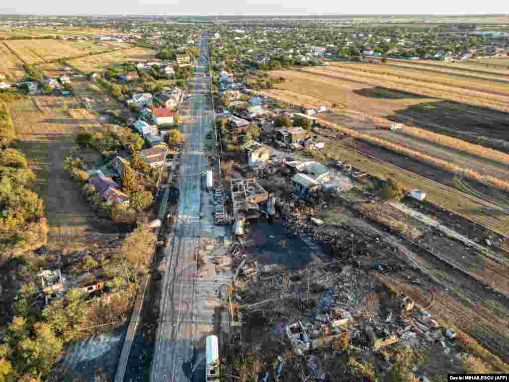 An aerial view shows the site of an explosion and fire of an LPG gas station in Crevedia, near Bucharest, on August 27.