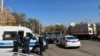 Kazakhstan -- A significant concentration of police near Central Park. Officers and police cars seen at the parking site. 25October2023