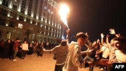 Iranians dance ahead of Nowruz, the Persian New Year, in Tehran on March 14. Dancing, a form of expression often suppressed by the government, has emerged as a symbolic act of civil disobedience.