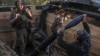 Ukrainian soldiers fire a mortar toward Russian troops at their position near a front line in the Zaporizhzhya region on September 4.
