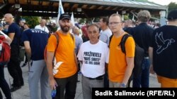 Ermin Zatega, (lijevo), Suljo Čakanović (u sredini) i Mahir Sijamija (desno) u Potočarima, 10. juli 2023.