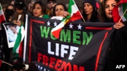 People rally against the Iranian government and express support with anti-government protesters in Iran at the Lincoln Memorial in Washington, DC, on February 11, the 44th anniversary of the Islamic Revolution.