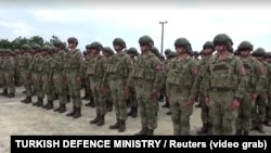 The Turkish Defense Ministry shared a video on June 4 showing troops wearing the insignia of the NATO-led KFOR peacekeeping force departing Turkey and arriving in Kosovo. 