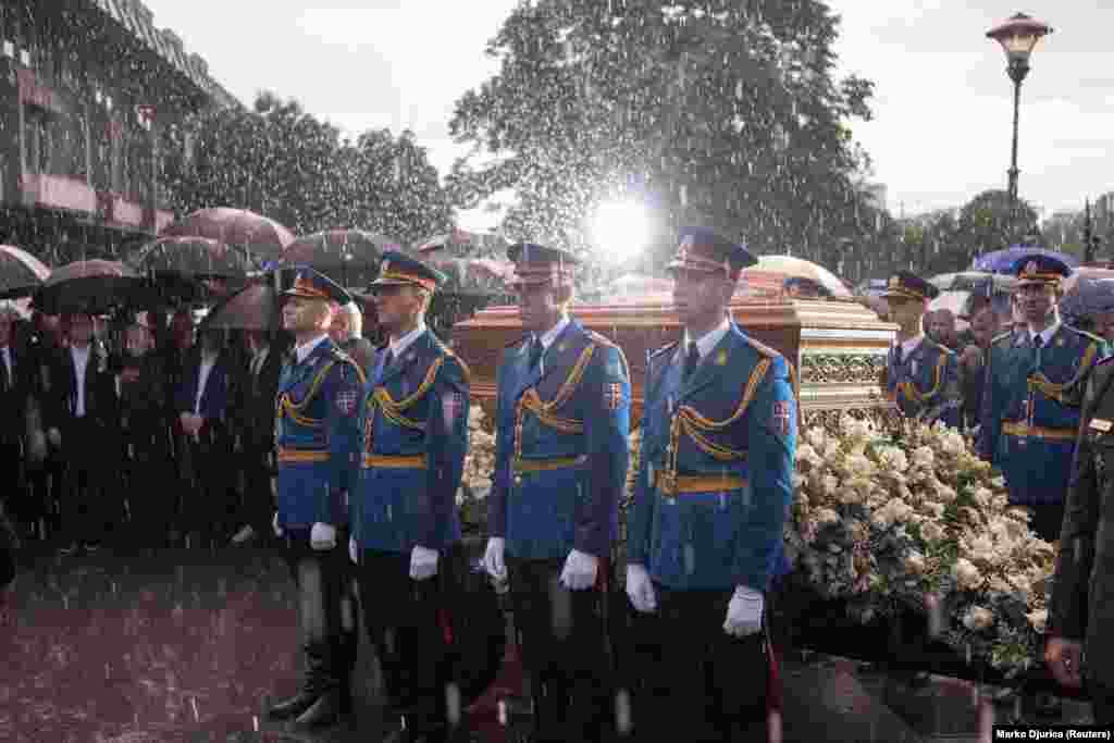 Soldiers stand guard near the coffin containing the saint&#39;s remains before it is brought inside the church. The Serbian Orthodox Church said up to 100,000 people marched in the procession. In early May, tens of thousands of people took to the streets to protest against gun violence and the government&#39;s response to back-to-back mass shootings. &nbsp;