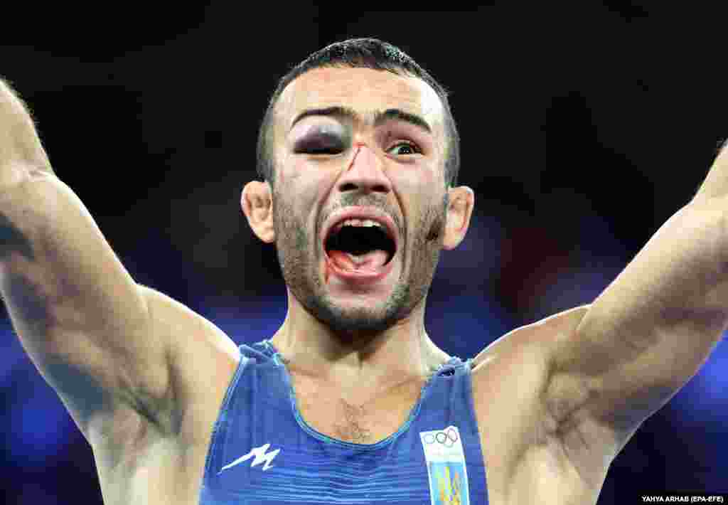 Ukraine&#39;s Parviz Nasibov celebrates winning his men&#39;s 67-kilogram Greco-Roman wrestling semifinal at the Paris Olympics.&nbsp;