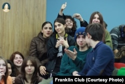 Members of the Franklin Club whom Georgia's ruling party has branded as '"satanists."