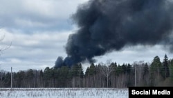 Video of the crash shows a plume of black smoke rising from the crash site near the airfield.