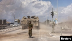Իսրայելցի զինվորականը Գազայի հատվածի սահմանի մոտակայքում, 15-ը հոկտեմբերի, 2023. 
