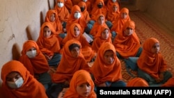 Younger girls attend class at a local school in Zabul on March 14.