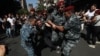 Armenia - Riot police arrest an anti-government protester in Yerevan, September 22, 2023.
