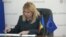 Moldova's central bank Governor Anca Dragu signs the application to join the Single Euro Payments Area in Chisinau on January 30.