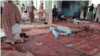 A screen grab from an amateur video that captured the aftermath of a blast in a mosque in Pol-e-Khomri in Afghanistan's Baghlan Province on October 13.