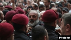 Archbishop Bagrat Galstanian leads an anti-government protest in Yerevan on May 31.