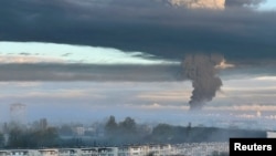 Smoke rises over Sevastopol on April 29.
