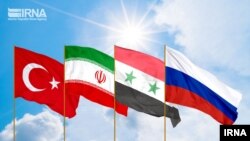 بیرق های کشور های روسیه ٬ سوریه ٬ ایران و ترکیه که در مذاکرات مسکو حضور داشتند 