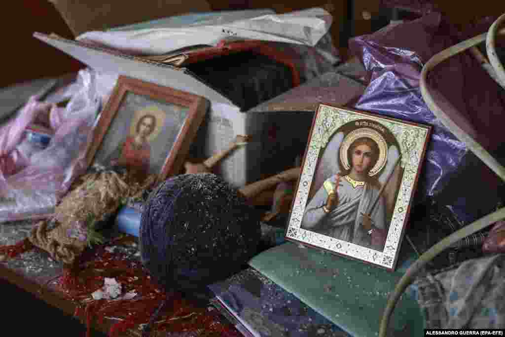 Orthodox icons inside an apartment damaged during fighting in the Spartak settlement near Donetsk in Russia-controlled Ukraine.