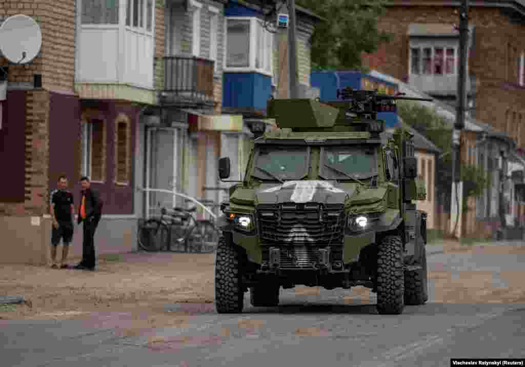 An armored vehicle is seen in the Ukrainian border town of Vovchansk, around 12 kilometers from Russia&rsquo;s Shebekino, on June 5. Ethnic Russian militants using Western-supplied Ukrainian equipment have made repeated incursions into the Belgorod region in recent days. &nbsp;