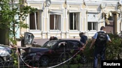 ფოტო არქივიდან. დრონებით შეტევის შედეგად დაზიანებული სახლი დონის როსტოვში