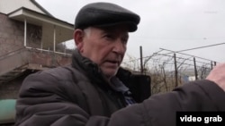 Armenia - A resident of the border village of Voskepar talks to RFE/RL, March 22, 2024.