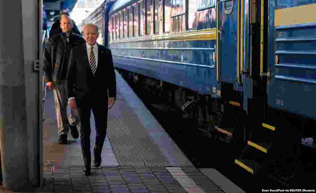 Biden arrives at a railway station in Kyiv before meeting with Ukrainian President Volodymyr Zelenskiy.